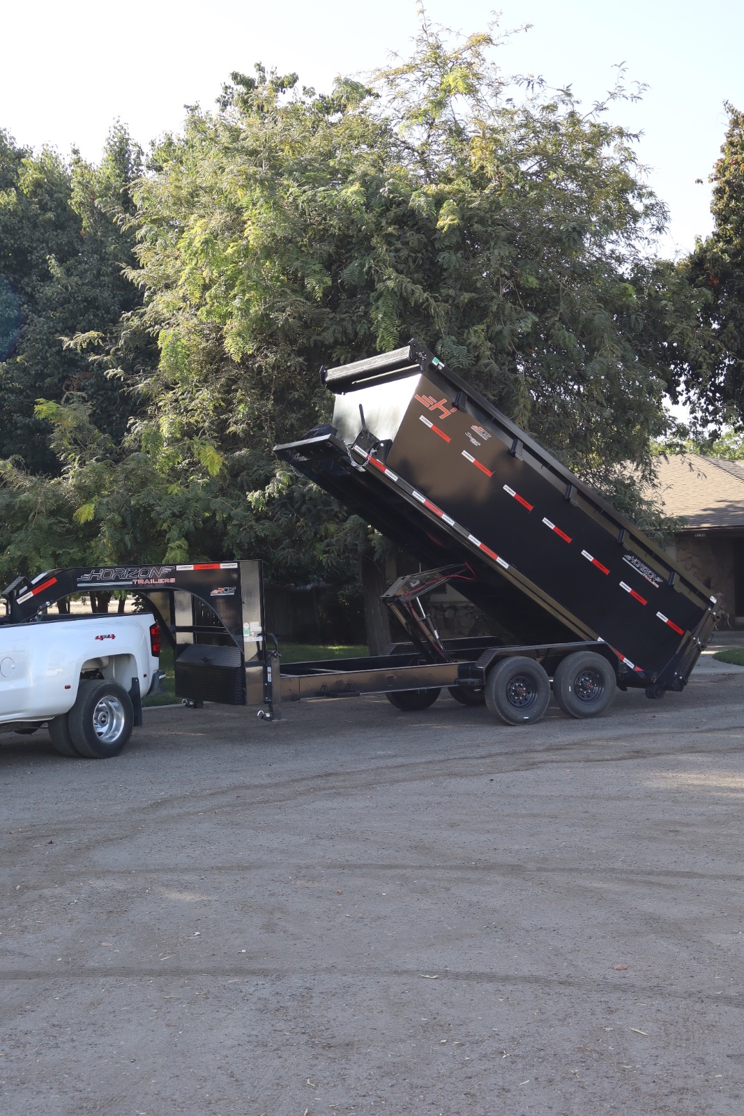 Truck dumping a load at the county landfill